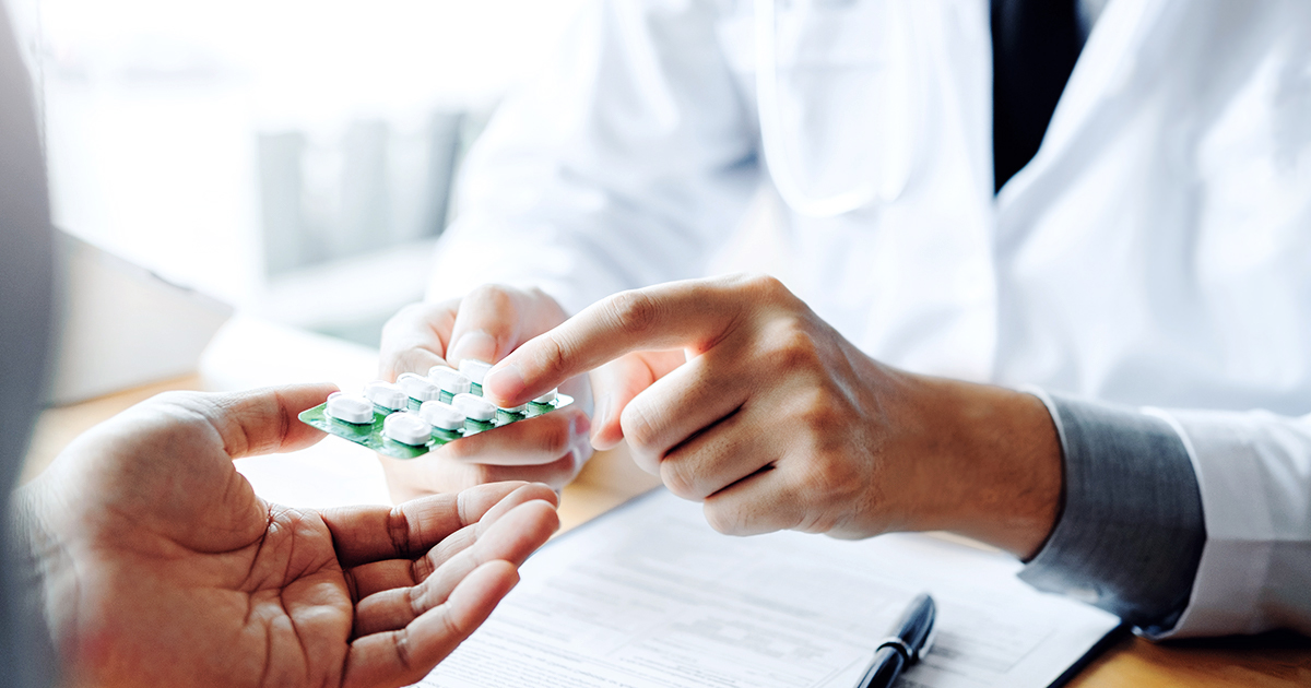 Healthcare Professional discussing medication with patients.